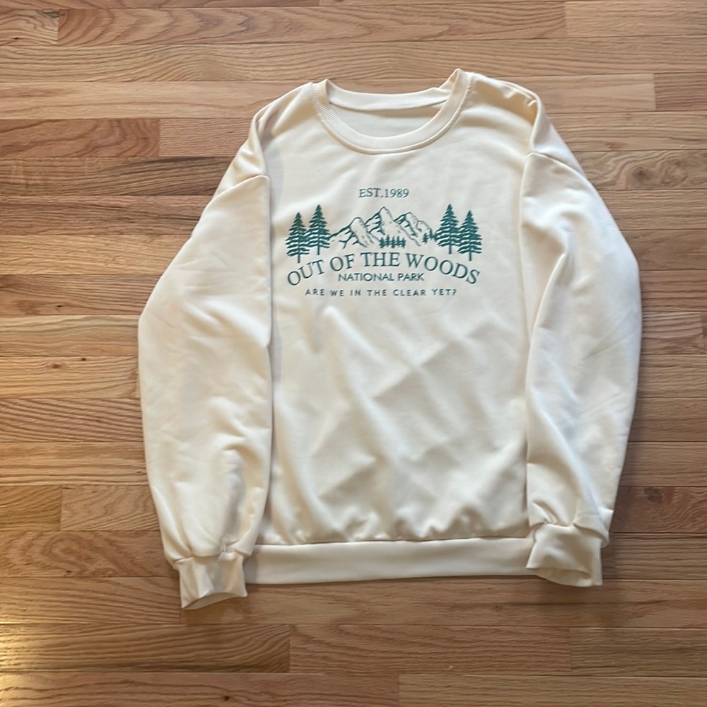 Are we out of the woods yet? tan crewneck